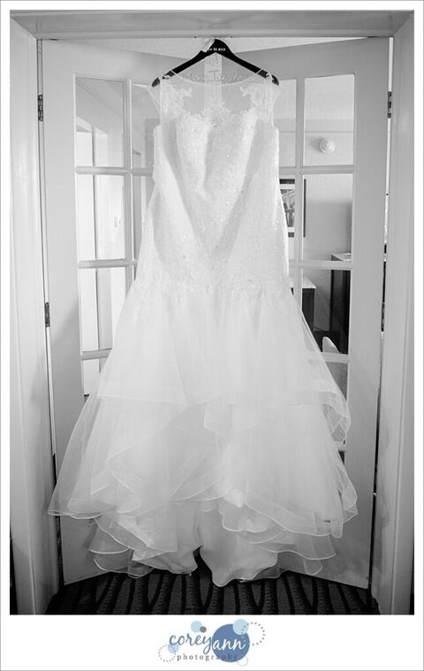 Bride's Dress hanging on doors