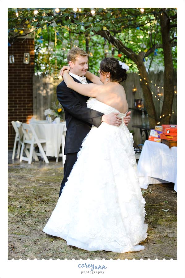 bride and groom first dance at wedding reception