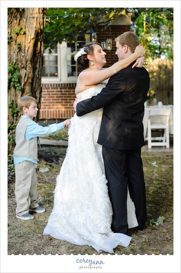 brides son cutting in during first dance