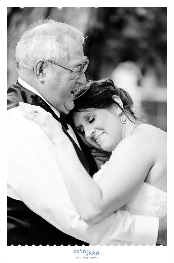 father daughter dance during backyard wedding reception
