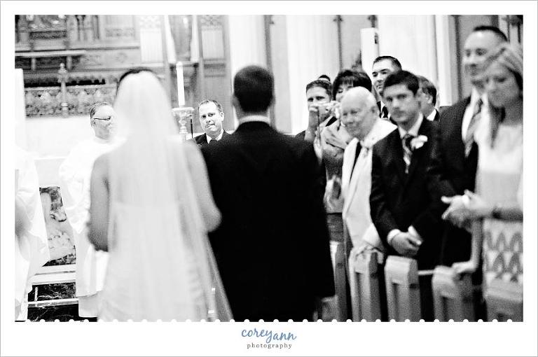 bride walking down aisle at wedding ceremony in downtown cleveland