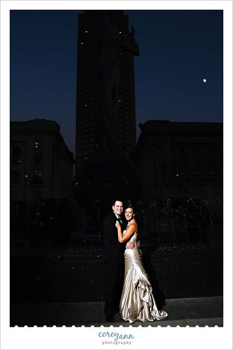 bride and groom in front of fountain of eternal life in cleveland ohio