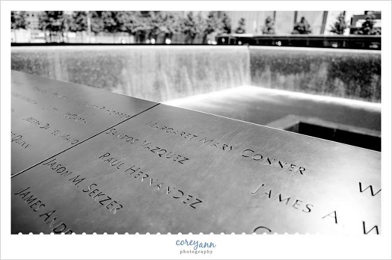 names around the fountain at the 9/11 memorial in new york city