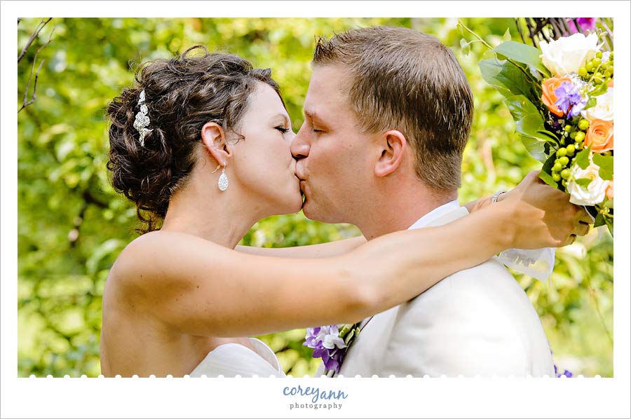 bride and groom kissing