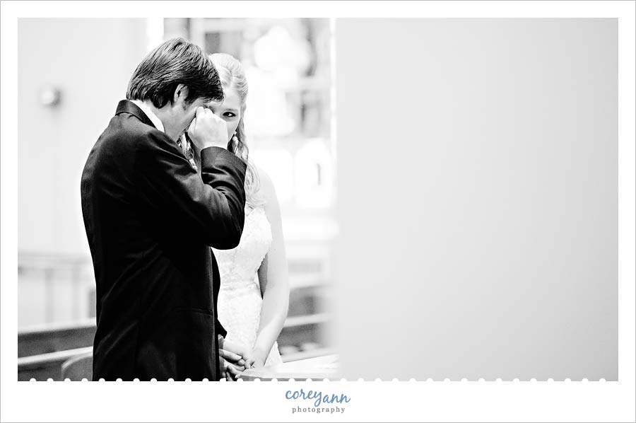 Jenny & John's Wedding groom crying during ceremony at st paul's church in north canton ohio