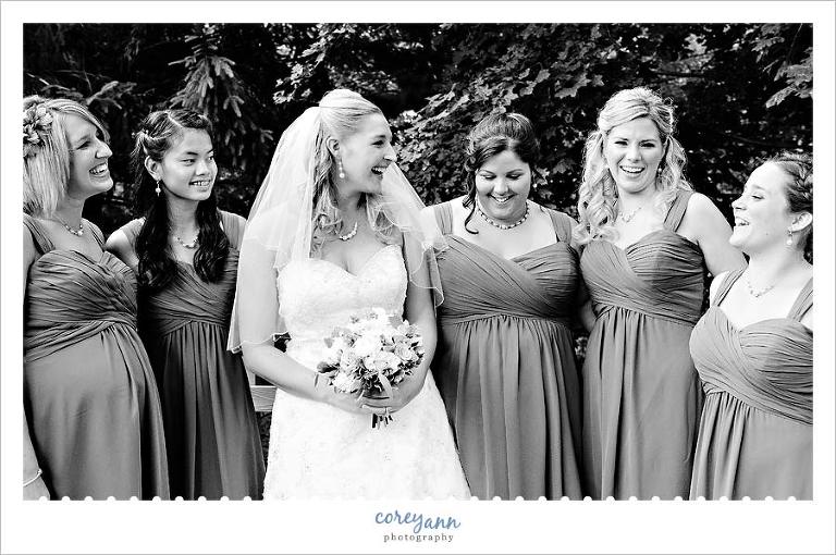 bride and bridesmaids laughing before ceremony