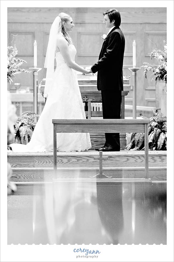 Jenny & John's Wedding bride and groom during wedding ceremony at st paul's in north canton ohio