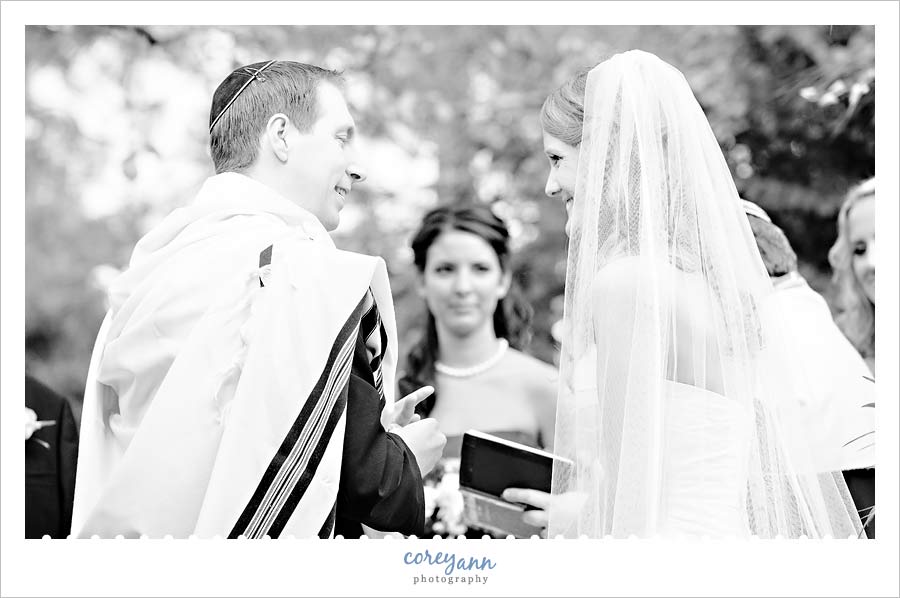 Stephanie and Mark's Wedding groom and bride smiling at each other during ceremony