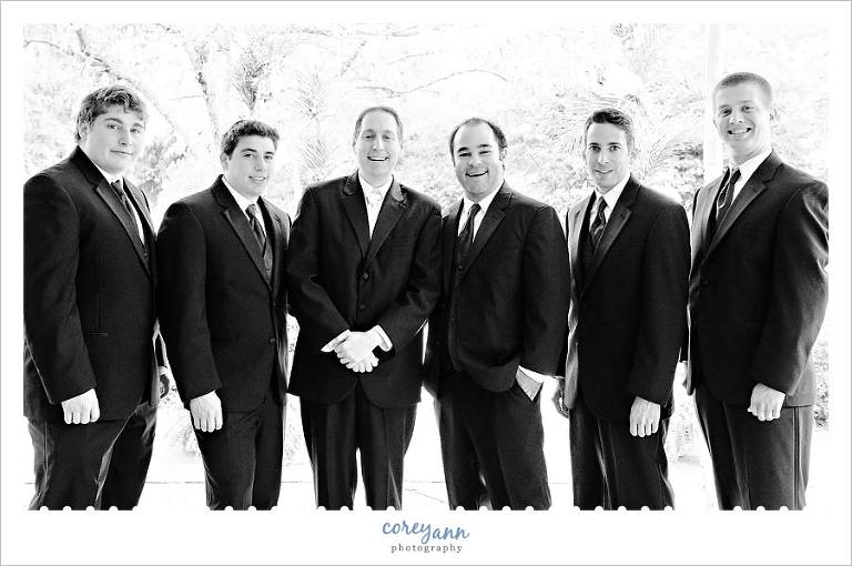 groom and groomsman in black and white