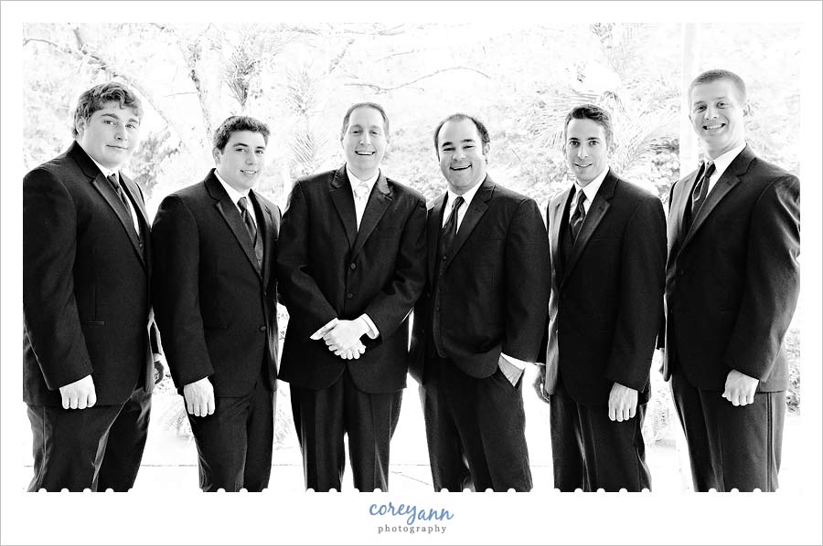 Stephanie and Mark's Wedding groom and groomsman in black and white