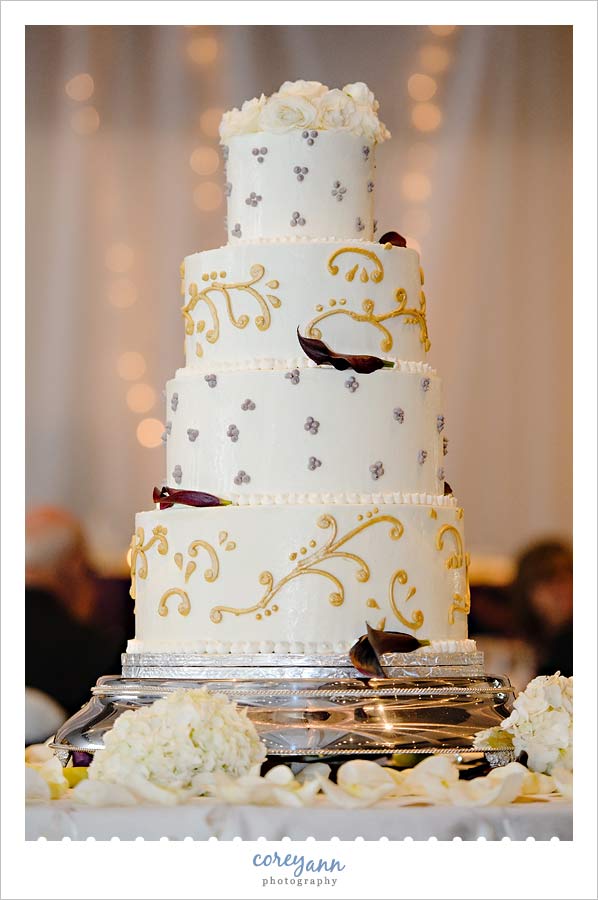 Stephanie and Mark's Wedding purple gold and silver wedding cake