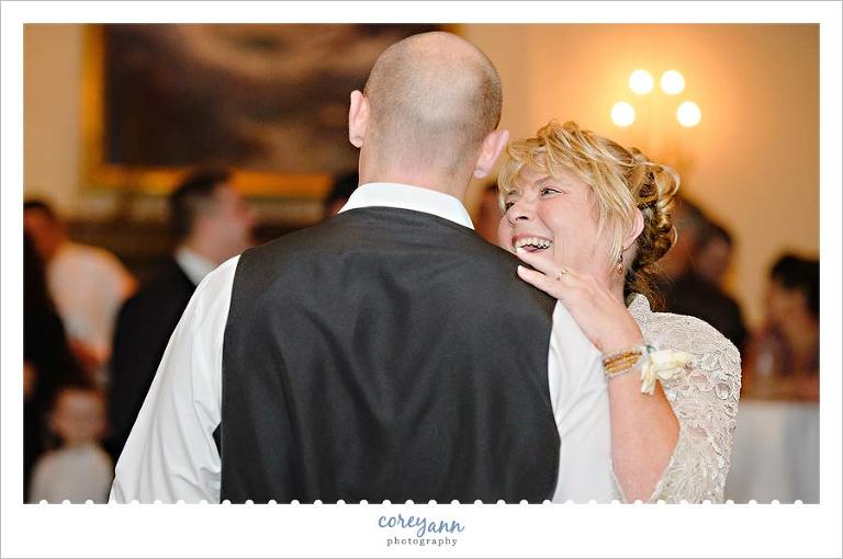 mother son dance during wedding reception at portage country club