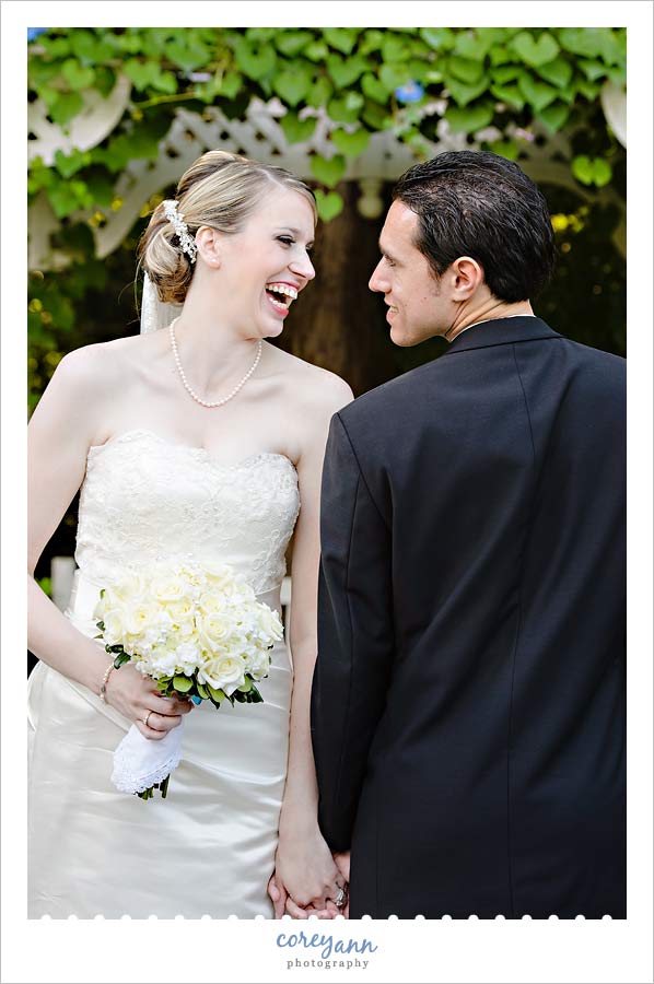 bride and groom laughing during portrait session in youngstown ohio