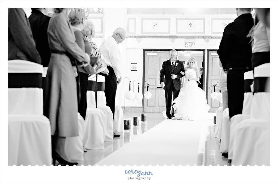 bride looking for groom when walking down the aisle