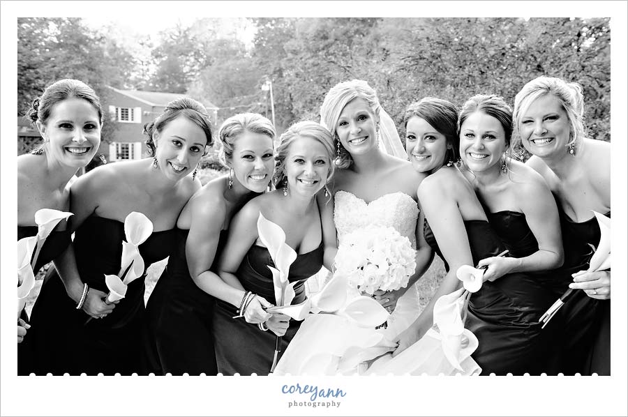 bridesmaids and bride posing at canton garden center