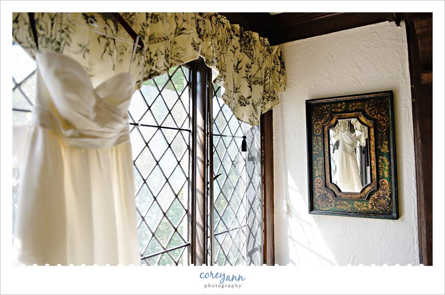 bride's wedding shoes that are a glittery gold peeptoe heel