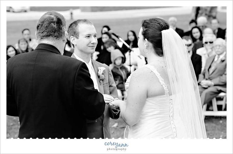 bride and groom reciting vows during ceremony