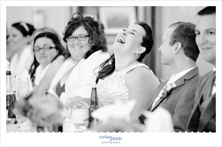 Jenny and Joe's Wedding bride laughing during toast at reception at rose cafe