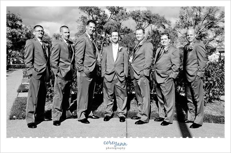 relaxed portrait of groom and groomsman in avon ohio