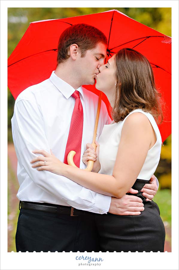 engagement session with red umbrella in canton ohio