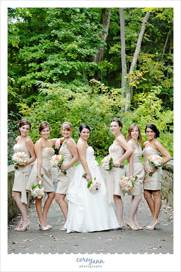 beige bridesmaid dresses with pink flowers