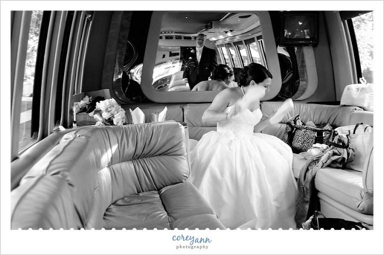 bride dancing inside limo