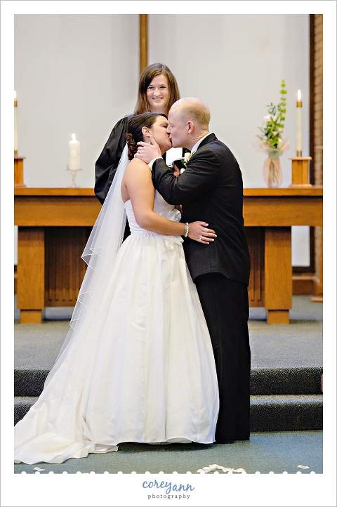 first kiss after wedding ceremony at john knox presbyterian
