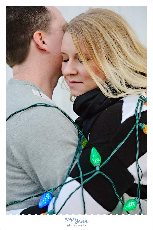 engagement portrait with christmas lights in north canton