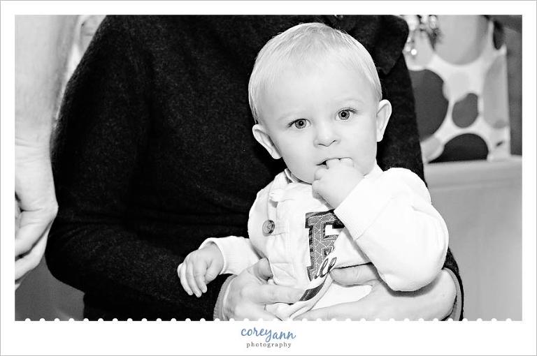 black and white portrait of a toddler at his birthday party