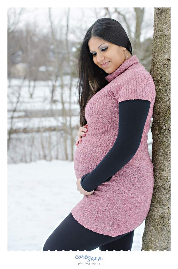 winter maternity session outdoors in the snow in canton ohio