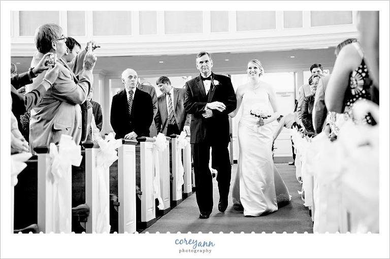 bride and father walking down the aisle at First Presbyterian Church of Youngstown