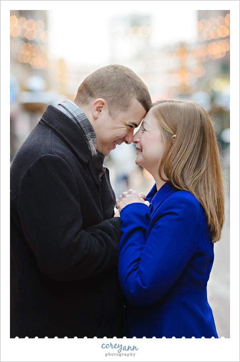 engagement session outside with coats on in the winter
