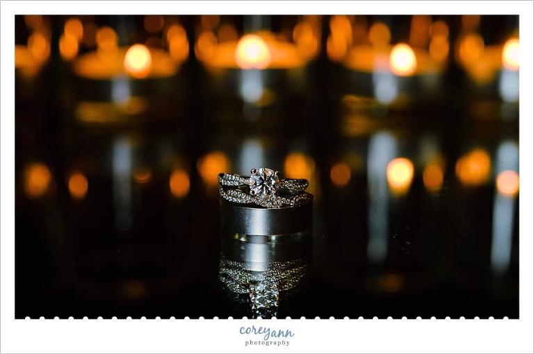 wedding rings with candles