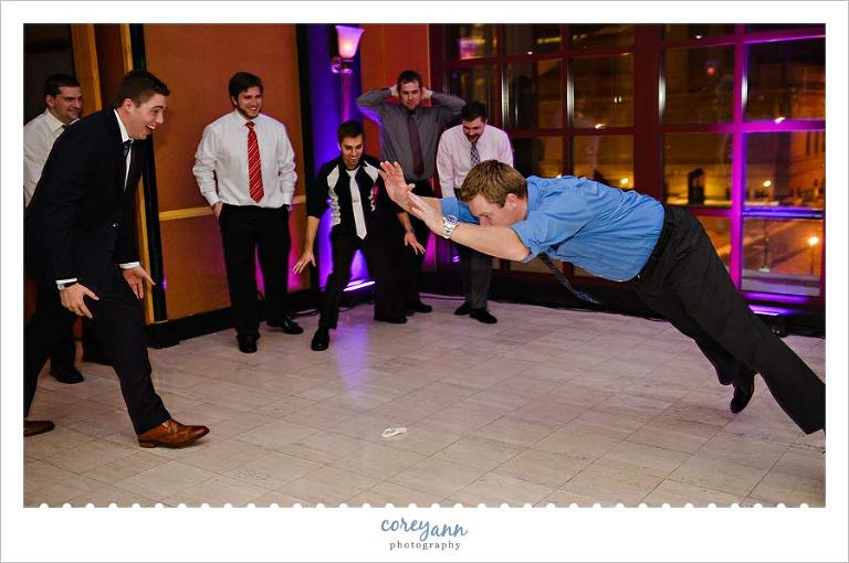 bachelors jumping over the garter after being tossed
