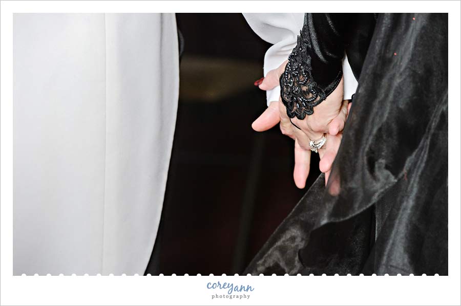 Ian and Terri's Wedding holding hands after wedding