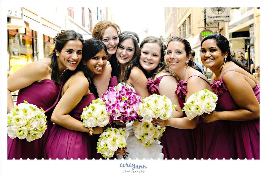 purple and green wedding party on east 4th street in cleveland