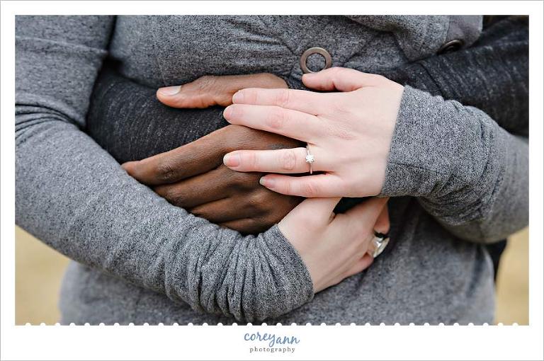 hands showing engagement ring