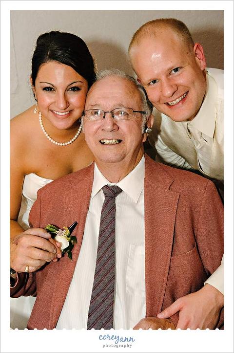bride and groom with grandpa