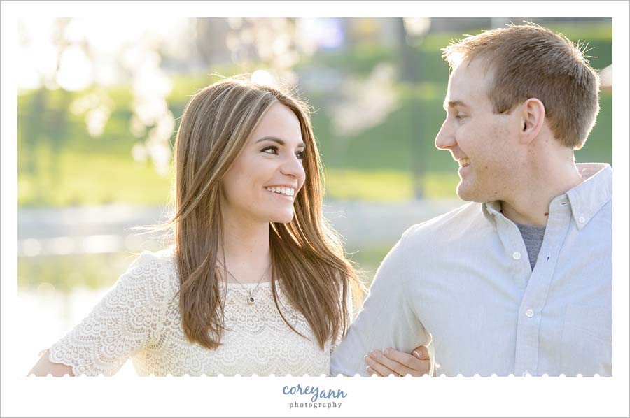 springtime engagement session with cherry blossoms at wade lagoon
