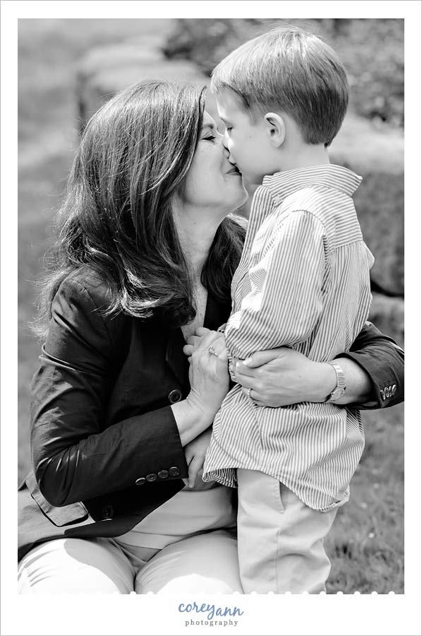 mother and son kissing