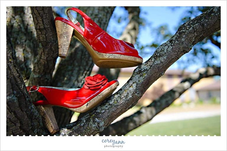 red heels in a tree for a wedding