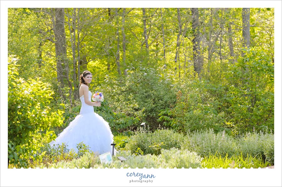 bride walking down aisle to ceremony at holden arboretum