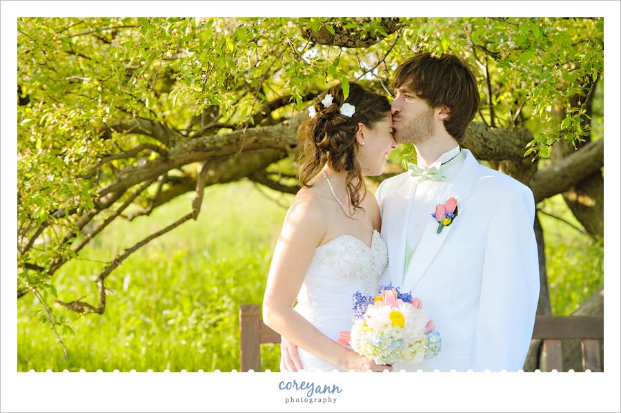 wedding portrait in the butterfly garden at holden arboretum