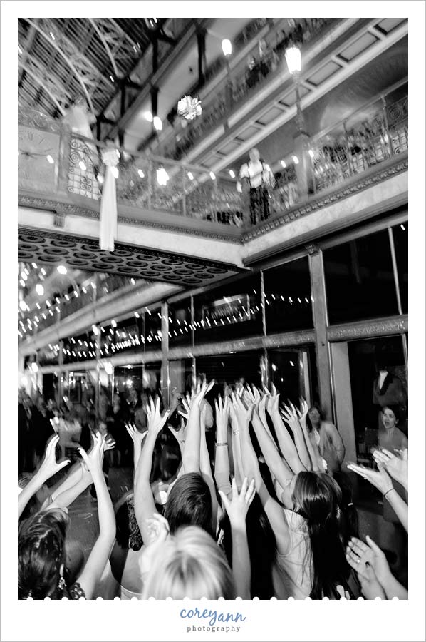 bride tossing bouquet