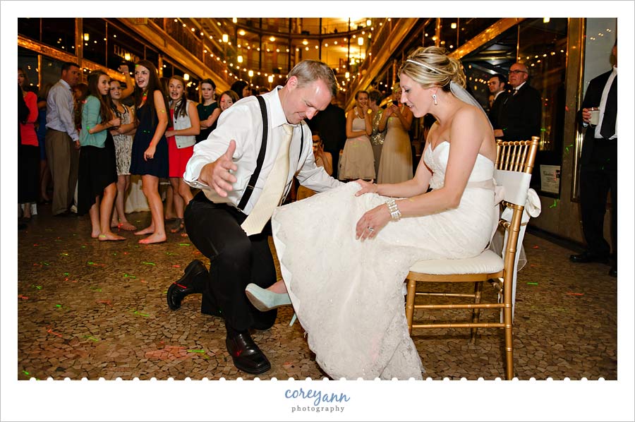 garter removal at wedding reception in downtown cleveland