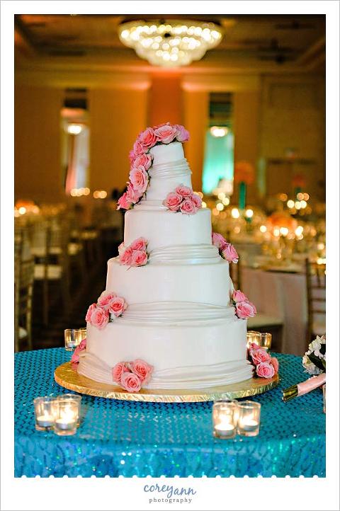 pink and white tiered wedding cake by phyllis lester designs