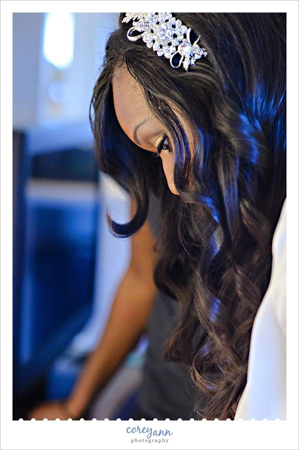bride with broach headpiece