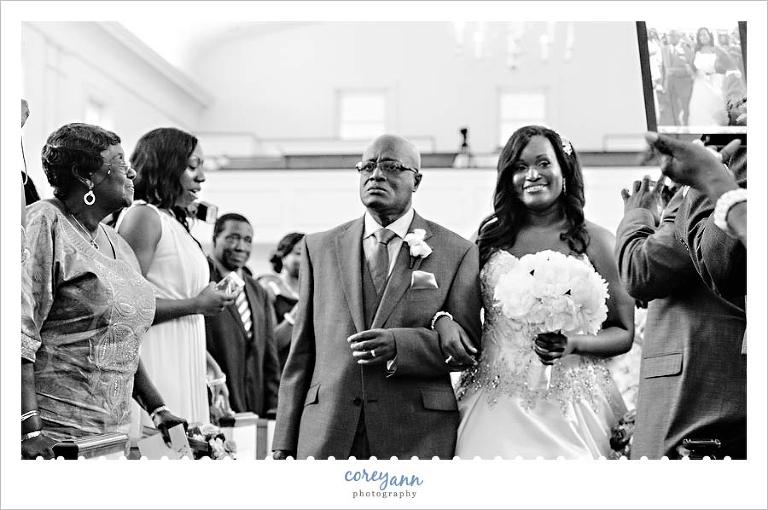 bride and father walking down aisle at westlake united methodist church