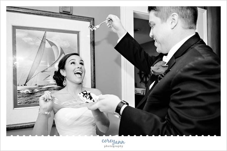 cake cutting with the bride and groom at wedding reception