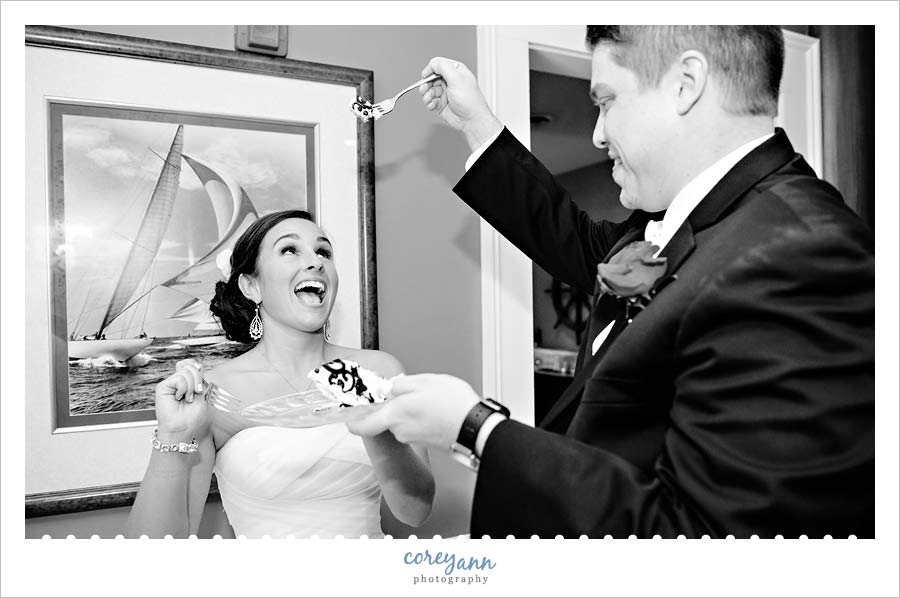 cake cutting with the bride and groom at wedding reception